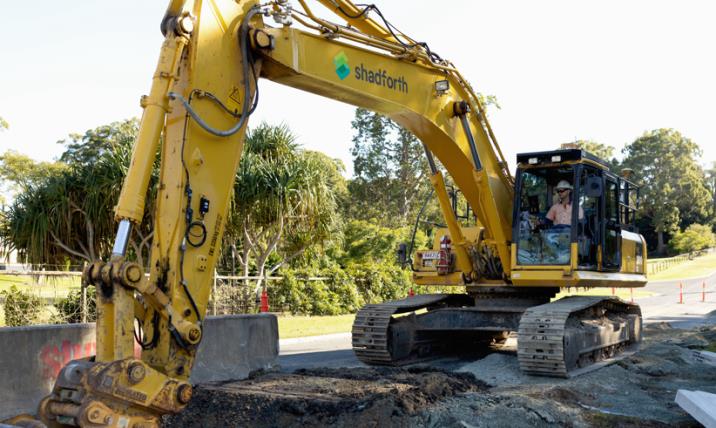 Shadforth Civil Engineering branded excavator on a Queensland civil construction site